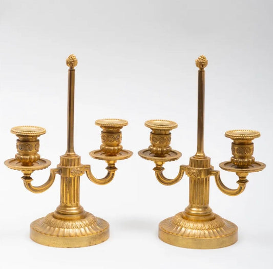 A Pair of Louis XVI Style Two-Light Ormolu Candlesticks