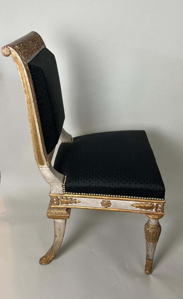 Pair of Italian Genoese Carved Parcel Gilt Side Chairs, circa 1820-30