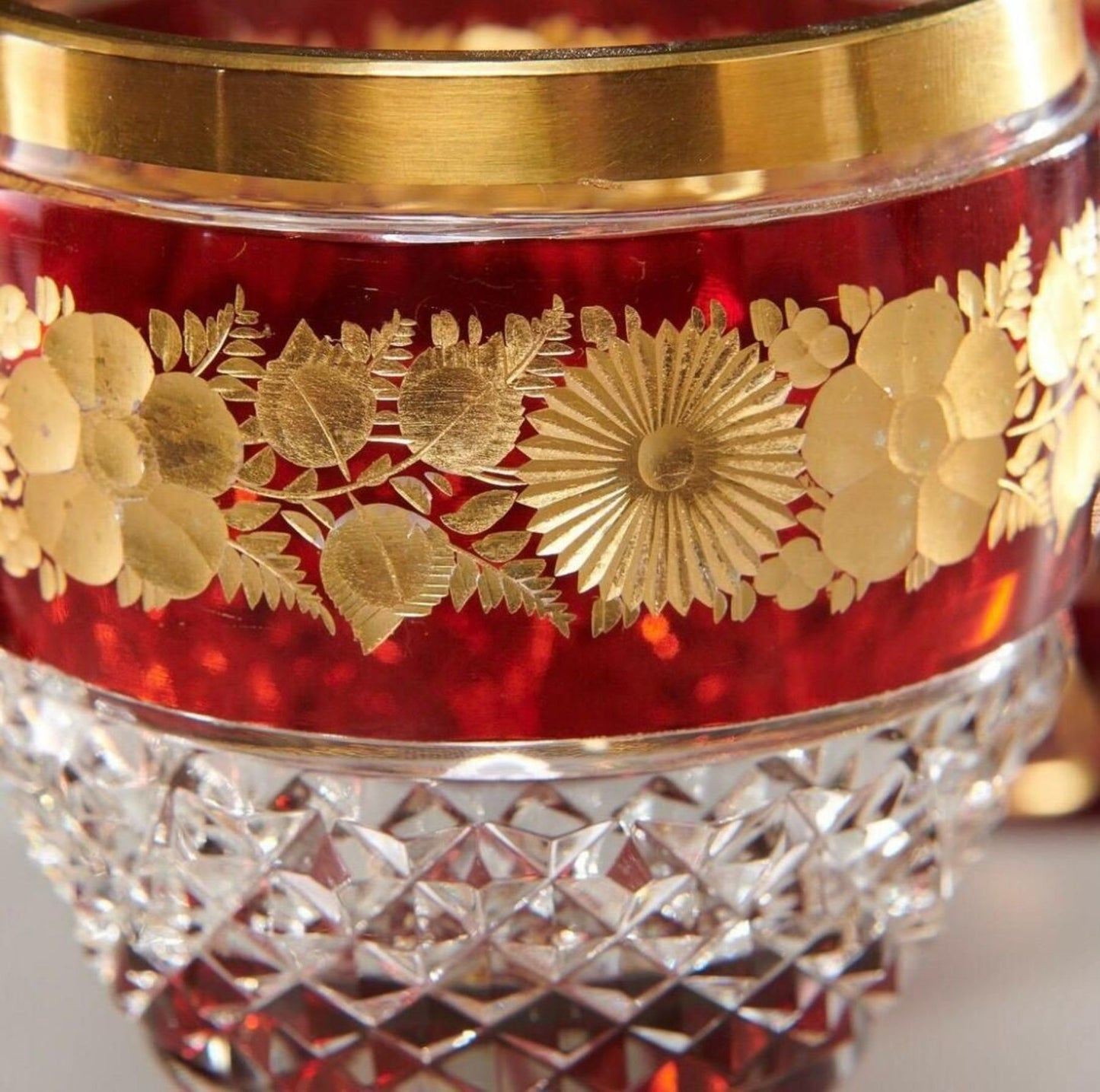 Set of 12 Ruby and Parcel-Gilt Bohemian Glasses, Late 19th Century