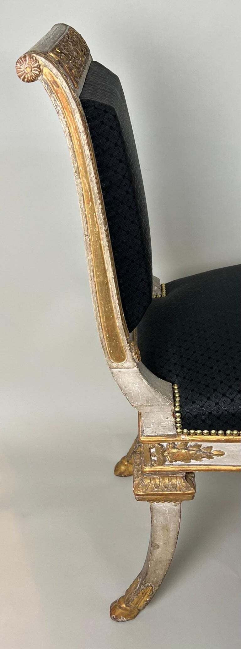 Pair of Italian Genoese Carved Parcel Gilt Side Chairs, circa 1820-30