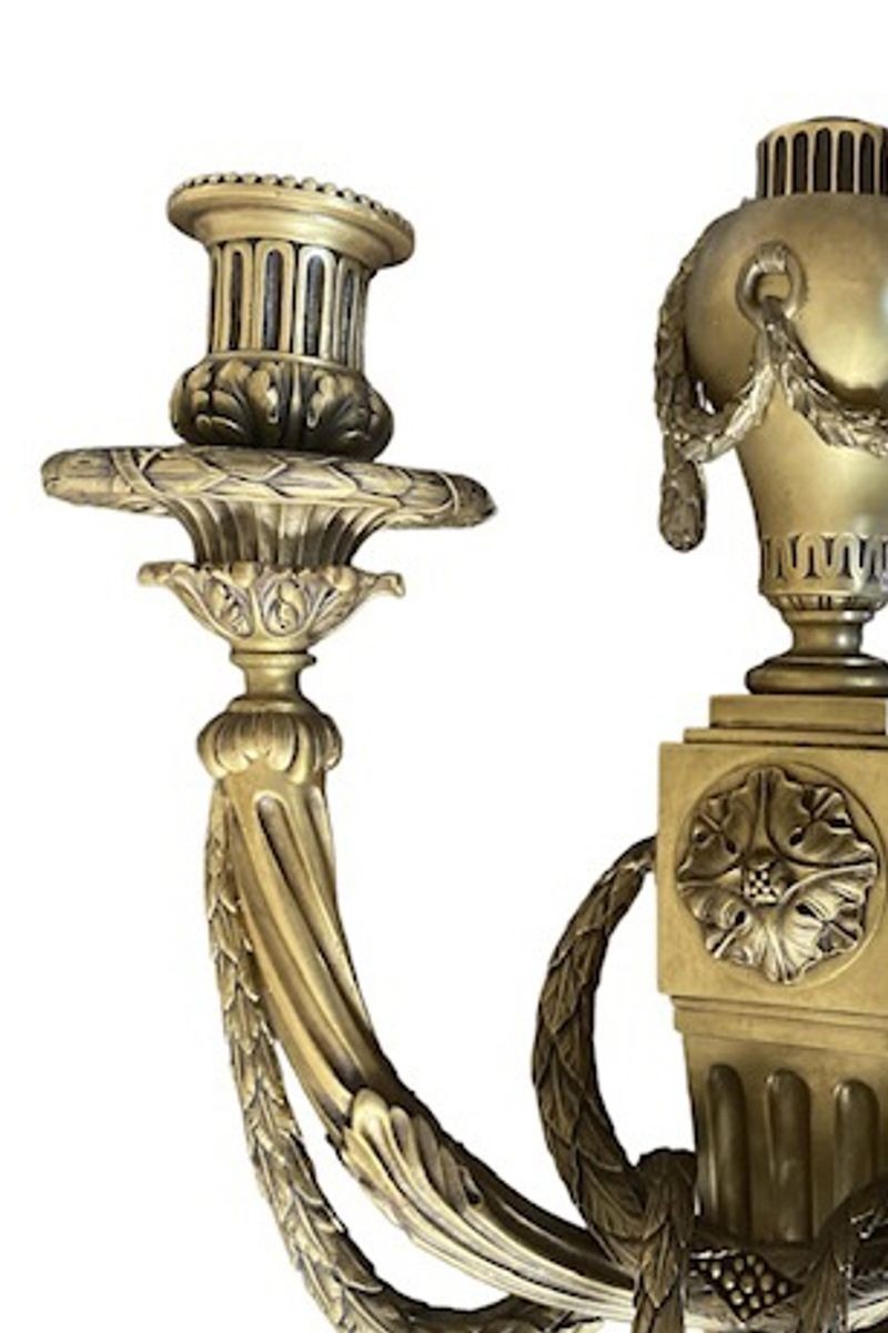 A Pair of Louis XVI Style Gilt Bronze Wall Lights, Stamped C within a diamond for Caldwell, circa 1930
