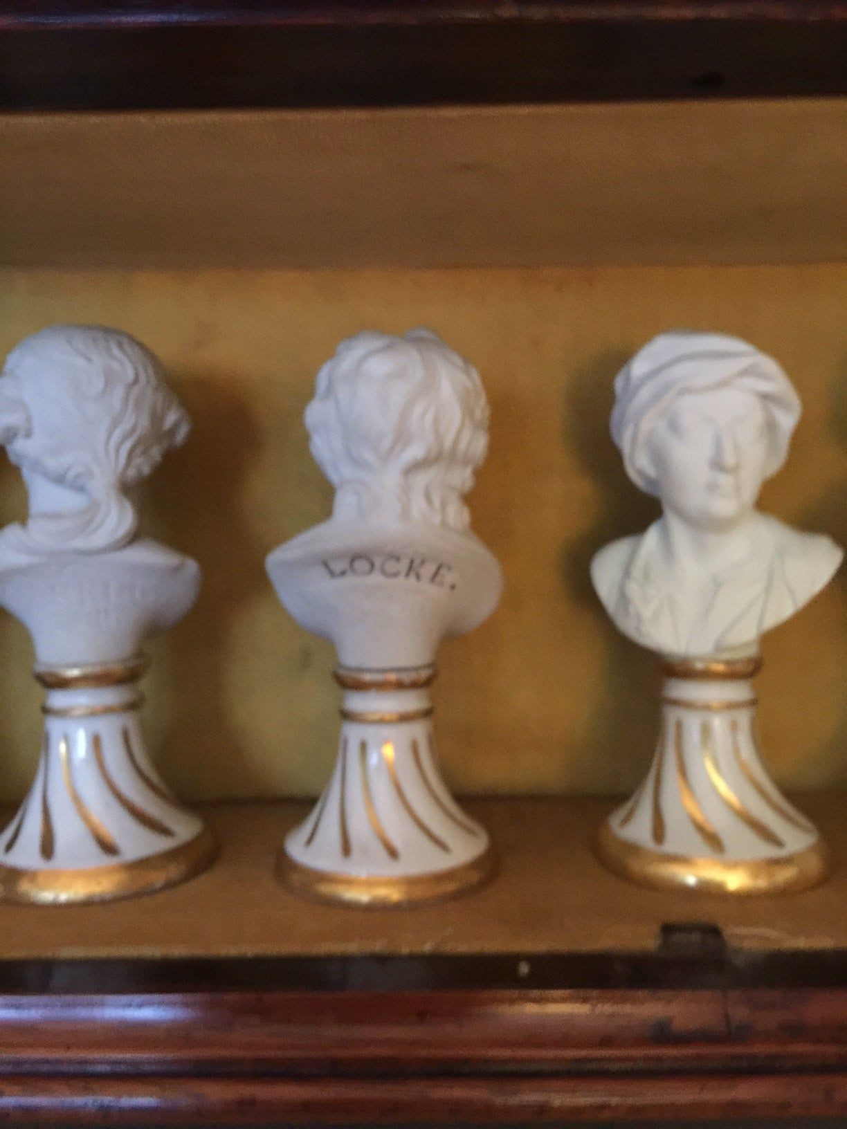 Seven Miniature Furstenberg Biscuit Porcelain Busts of English Men of Letters